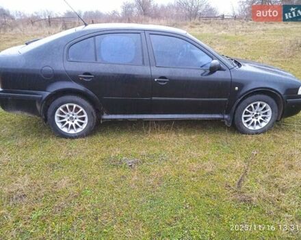 Черный Шкода Октавия, объемом двигателя 1.6 л и пробегом 410 тыс. км за 3200 $, фото 3 на Automoto.ua