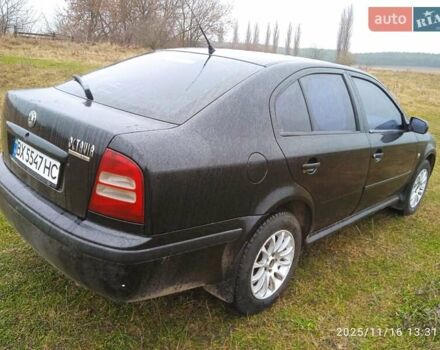 Черный Шкода Октавия, объемом двигателя 1.6 л и пробегом 410 тыс. км за 3200 $, фото 4 на Automoto.ua