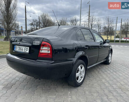 Черный Шкода Октавия, объемом двигателя 2 л и пробегом 261 тыс. км за 6000 $, фото 15 на Automoto.ua