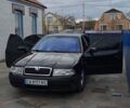 Черный Шкода Октавия, объемом двигателя 1.8 л и пробегом 300 тыс. км за 4900 $, фото 1 на Automoto.ua