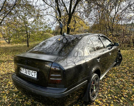Черный Шкода Октавия, объемом двигателя 1.6 л и пробегом 350 тыс. км за 4200 $, фото 5 на Automoto.ua