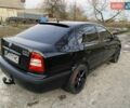 Черный Шкода Октавия, объемом двигателя 1.6 л и пробегом 175 тыс. км за 6000 $, фото 3 на Automoto.ua