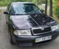 Черный Шкода Октавия, объемом двигателя 1.6 л и пробегом 230 тыс. км за 3900 $, фото 1 на Automoto.ua
