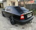 Черный Шкода Октавия, объемом двигателя 1.6 л и пробегом 175 тыс. км за 6000 $, фото 1 на Automoto.ua