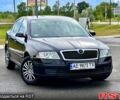 Черный Шкода Октавия, объемом двигателя 1.6 л и пробегом 235 тыс. км за 4950 $, фото 1 на Automoto.ua