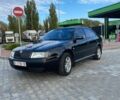 Черный Шкода Октавия, объемом двигателя 1.8 л и пробегом 305 тыс. км за 4700 $, фото 1 на Automoto.ua