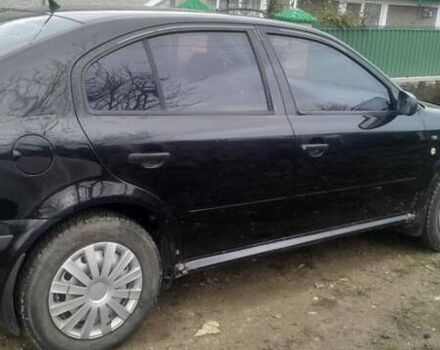 Черный Шкода Октавия, объемом двигателя 1.6 л и пробегом 278 тыс. км за 3800 $, фото 2 на Automoto.ua