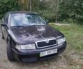 Черный Шкода Октавия, объемом двигателя 1.6 л и пробегом 230 тыс. км за 3900 $, фото 1 на Automoto.ua