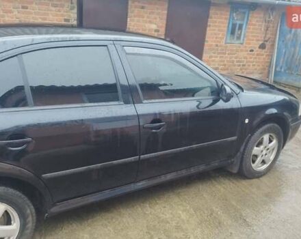 Черный Шкода Октавия, объемом двигателя 1.6 л и пробегом 170 тыс. км за 4500 $, фото 2 на Automoto.ua