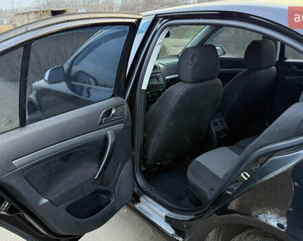 Черный Шкода Октавия, объемом двигателя 1.6 л и пробегом 287 тыс. км за 5600 $, фото 6 на Automoto.ua