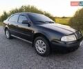 Черный Шкода Октавия, объемом двигателя 1.6 л и пробегом 352 тыс. км за 3400 $, фото 1 на Automoto.ua