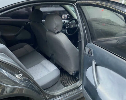 Черный Шкода Октавия, объемом двигателя 1.6 л и пробегом 359 тыс. км за 5100 $, фото 10 на Automoto.ua