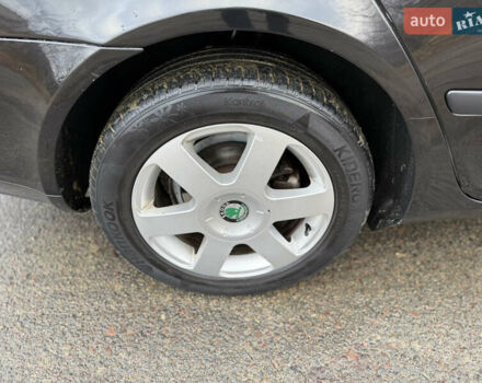 Черный Шкода Октавия, объемом двигателя 1.6 л и пробегом 210 тыс. км за 5450 $, фото 39 на Automoto.ua