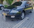 Черный Шкода Октавия, объемом двигателя 1.6 л и пробегом 256 тыс. км за 5700 $, фото 1 на Automoto.ua