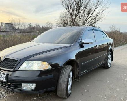 Черный Шкода Октавия, объемом двигателя 1.6 л и пробегом 287 тыс. км за 5600 $, фото 1 на Automoto.ua