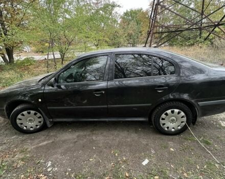 Черный Шкода Октавия, объемом двигателя 1.8 л и пробегом 210 тыс. км за 3799 $, фото 5 на Automoto.ua