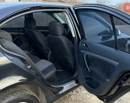 Черный Шкода Октавия, объемом двигателя 1.6 л и пробегом 287 тыс. км за 5600 $, фото 5 на Automoto.ua