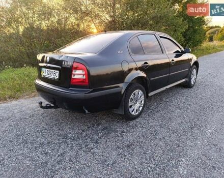 Черный Шкода Октавия, объемом двигателя 1.6 л и пробегом 352 тыс. км за 3400 $, фото 4 на Automoto.ua