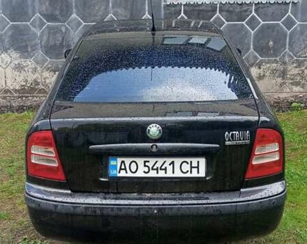 Черный Шкода Октавия, объемом двигателя 1.6 л и пробегом 292 тыс. км за 3900 $, фото 2 на Automoto.ua