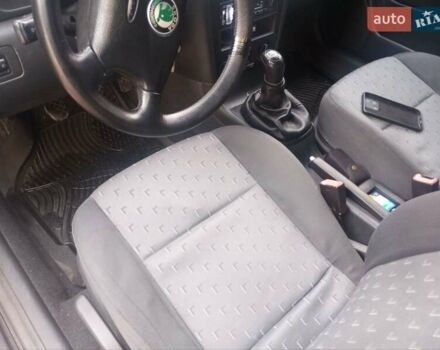 Черный Шкода Октавия, объемом двигателя 1.6 л и пробегом 194 тыс. км за 4800 $, фото 5 на Automoto.ua