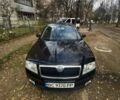 Черный Шкода Октавия, объемом двигателя 1.6 л и пробегом 215 тыс. км за 5500 $, фото 1 на Automoto.ua