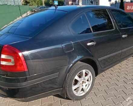 Черный Шкода Октавия, объемом двигателя 2 л и пробегом 248 тыс. км за 5700 $, фото 3 на Automoto.ua