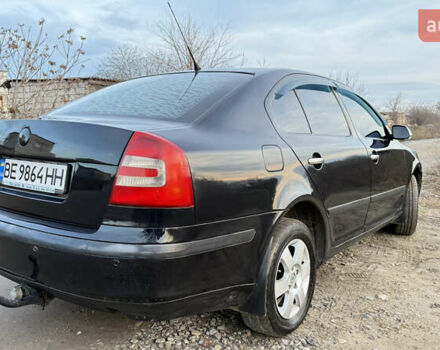 Черный Шкода Октавия, объемом двигателя 1.6 л и пробегом 287 тыс. км за 5600 $, фото 3 на Automoto.ua