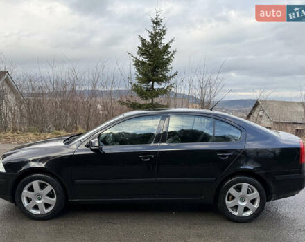 Черный Шкода Октавия, объемом двигателя 1.6 л и пробегом 210 тыс. км за 5450 $, фото 47 на Automoto.ua