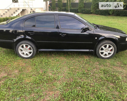 Черный Шкода Октавия, объемом двигателя 1.6 л и пробегом 165 тыс. км за 4700 $, фото 8 на Automoto.ua