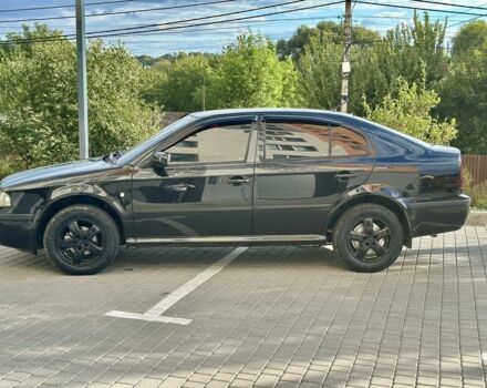 Черный Шкода Октавия, объемом двигателя 1.6 л и пробегом 300 тыс. км за 4700 $, фото 1 на Automoto.ua