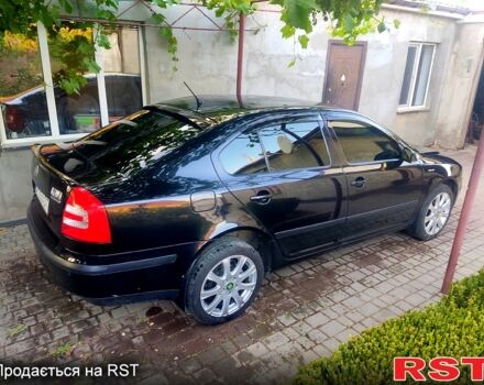 Черный Шкода Октавия, объемом двигателя 1.6 л и пробегом 215 тыс. км за 6000 $, фото 1 на Automoto.ua