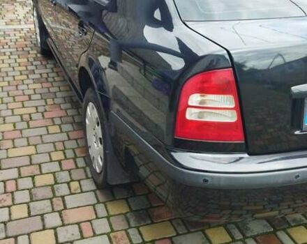 Черный Шкода Октавия, объемом двигателя 1.6 л и пробегом 365 тыс. км за 5500 $, фото 6 на Automoto.ua