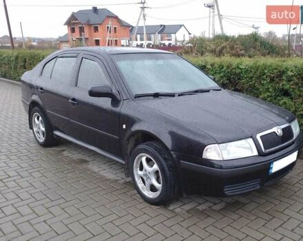 Черный Шкода Октавия, объемом двигателя 1.6 л и пробегом 180 тыс. км за 5250 $, фото 2 на Automoto.ua