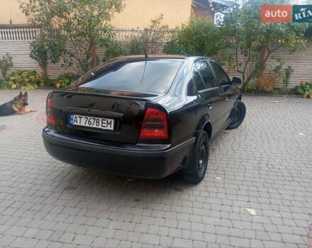 Черный Шкода Октавия, объемом двигателя 1.6 л и пробегом 194 тыс. км за 4800 $, фото 4 на Automoto.ua