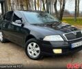 Черный Шкода Октавия, объемом двигателя 1.6 л и пробегом 256 тыс. км за 5800 $, фото 1 на Automoto.ua