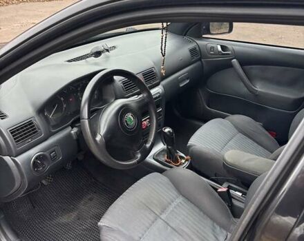 Черный Шкода Октавия, объемом двигателя 1.8 л и пробегом 297 тыс. км за 6500 $, фото 8 на Automoto.ua