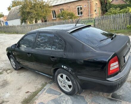 Черный Шкода Октавия, объемом двигателя 1.6 л и пробегом 210 тыс. км за 5200 $, фото 6 на Automoto.ua