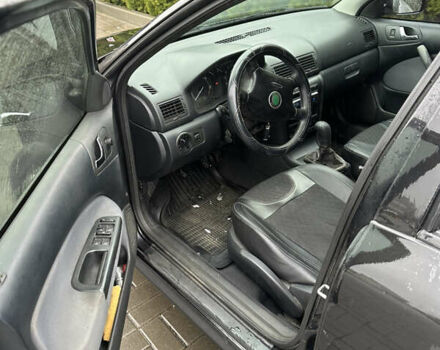 Черный Шкода Октавия, объемом двигателя 1.9 л и пробегом 302 тыс. км за 5950 $, фото 12 на Automoto.ua