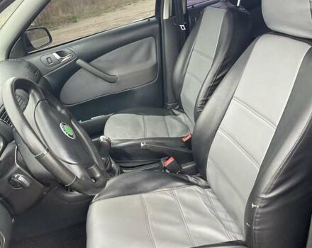 Черный Шкода Октавия, объемом двигателя 1.6 л и пробегом 204 тыс. км за 4100 $, фото 7 на Automoto.ua