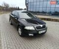 Черный Шкода Октавия, объемом двигателя 2 л и пробегом 240 тыс. км за 3500 $, фото 2 на Automoto.ua