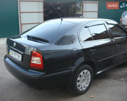 Черный Шкода Октавия, объемом двигателя 1.6 л и пробегом 176 тыс. км за 6800 $, фото 5 на Automoto.ua