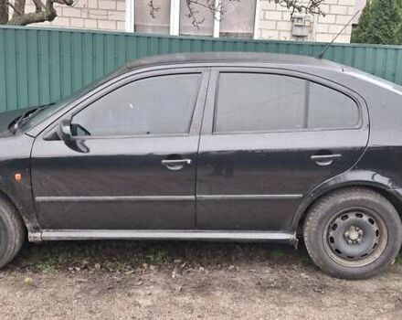 Черный Шкода Октавия, объемом двигателя 1.6 л и пробегом 292 тыс. км за 4500 $, фото 1 на Automoto.ua
