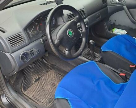 Черный Шкода Октавия, объемом двигателя 1.6 л и пробегом 260 тыс. км за 6500 $, фото 2 на Automoto.ua