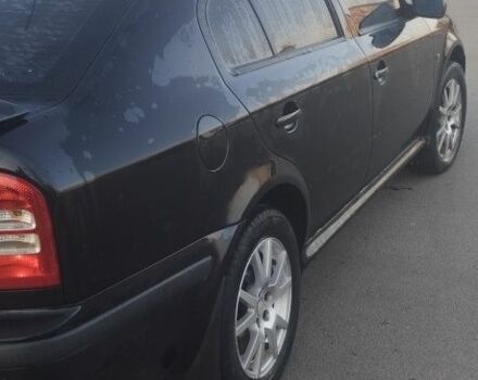 Черный Шкода Октавия, объемом двигателя 1.8 л и пробегом 270 тыс. км за 5400 $, фото 2 на Automoto.ua