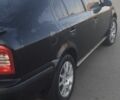Черный Шкода Октавия, объемом двигателя 1.8 л и пробегом 270 тыс. км за 5400 $, фото 2 на Automoto.ua