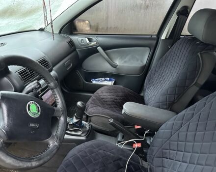 Черный Шкода Октавия, объемом двигателя 1.6 л и пробегом 210 тыс. км за 5200 $, фото 5 на Automoto.ua