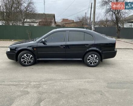 Черный Шкода Октавия, объемом двигателя 1.6 л и пробегом 292 тыс. км за 5250 $, фото 6 на Automoto.ua