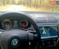 Черный Шкода Октавия, объемом двигателя 2 л и пробегом 312 тыс. км за 7300 $, фото 1 на Automoto.ua