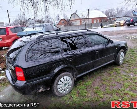 Черный Шкода Октавия, объемом двигателя 1.6 л и пробегом 187 тыс. км за 5700 $, фото 1 на Automoto.ua
