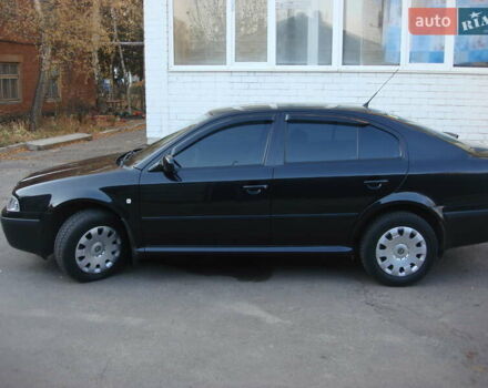 Черный Шкода Октавия, объемом двигателя 1.6 л и пробегом 176 тыс. км за 6800 $, фото 2 на Automoto.ua